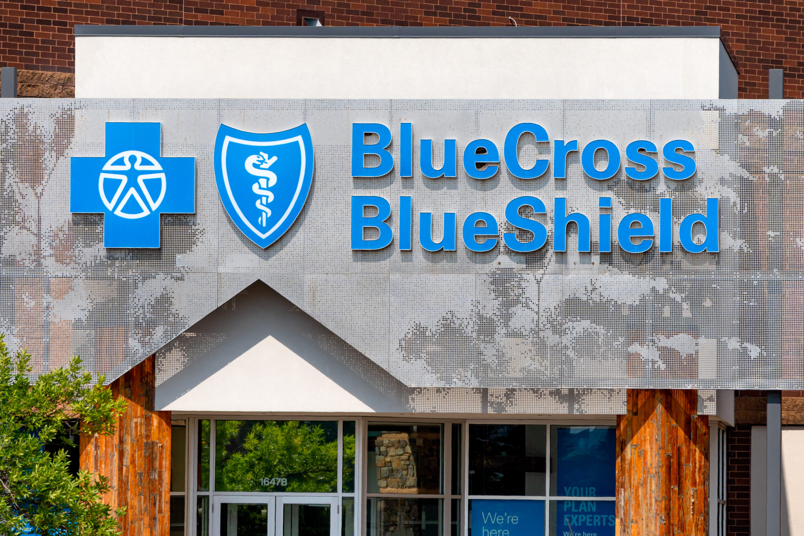 ROSEVILLE, MN/USA - AUGUST 23, 2020: BlueCross BlueShield medical clinic exterior and trademark logo.